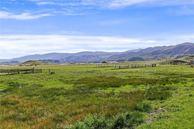 view of mountain feature with a rural view