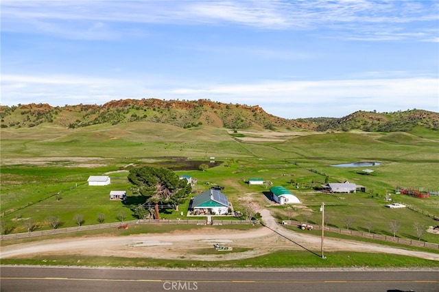 birds eye view of property featuring a rural view and a mountain view