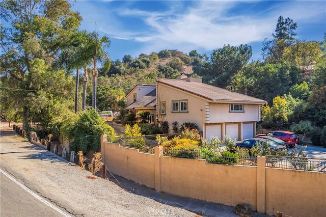 view of home's exterior with a garage