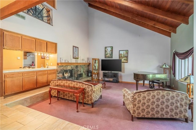 living room featuring beam ceiling, high vaulted ceiling, and wooden ceiling