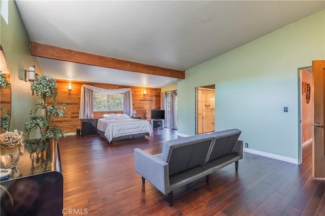 bedroom featuring wood walls, dark hardwood / wood-style flooring, and beamed ceiling