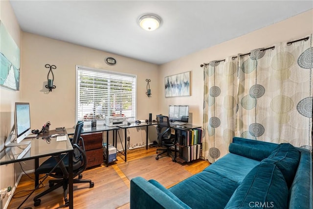 home office featuring light hardwood / wood-style floors