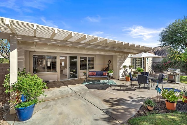 view of patio featuring a pergola and area for grilling