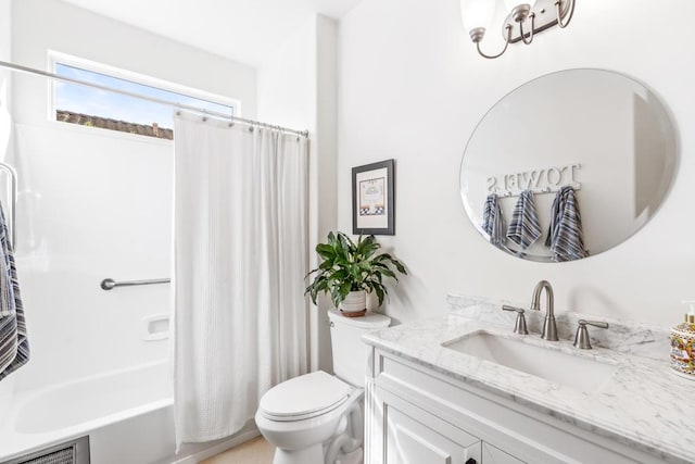 full bathroom featuring vanity, toilet, and shower / tub combo with curtain