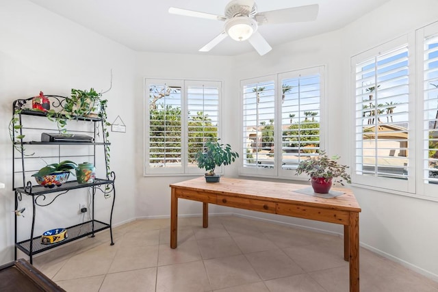 tiled home office with ceiling fan