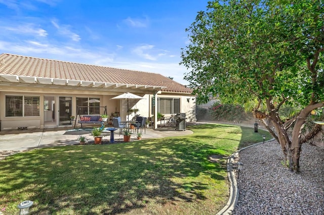 back of house featuring a lawn, an outdoor living space, a patio area, and a pergola