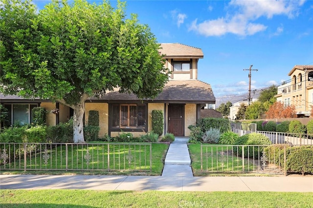 view of front of house with a front lawn