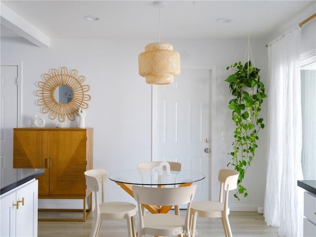 dining room featuring light hardwood / wood-style floors