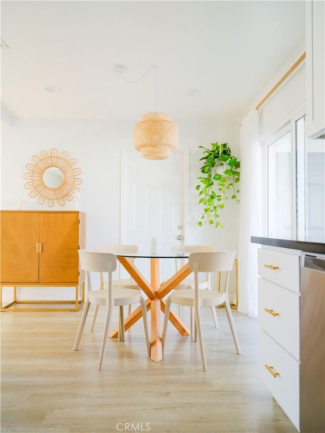 dining room featuring light hardwood / wood-style floors