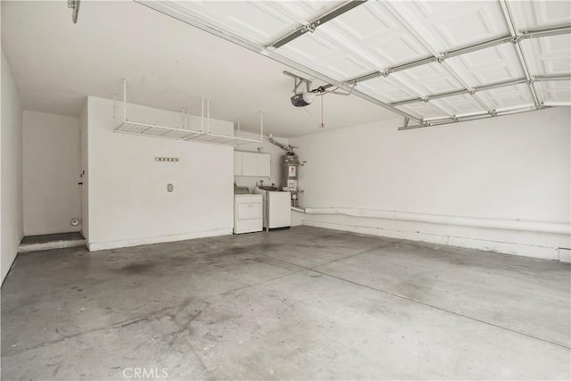 garage with secured water heater, independent washer and dryer, and a garage door opener