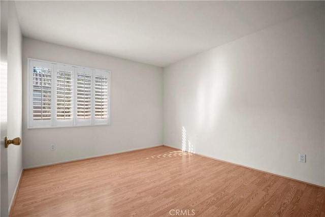 empty room featuring light hardwood / wood-style flooring