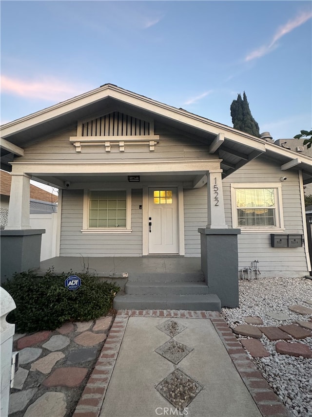 view of front of home with covered porch