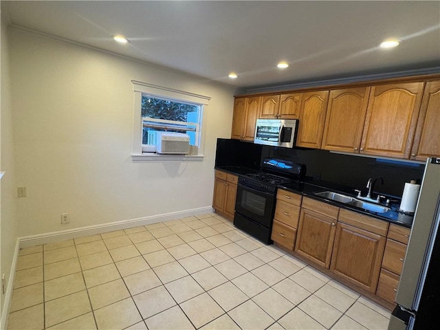 kitchen featuring cooling unit, sink, light tile patterned floors, and stainless steel appliances