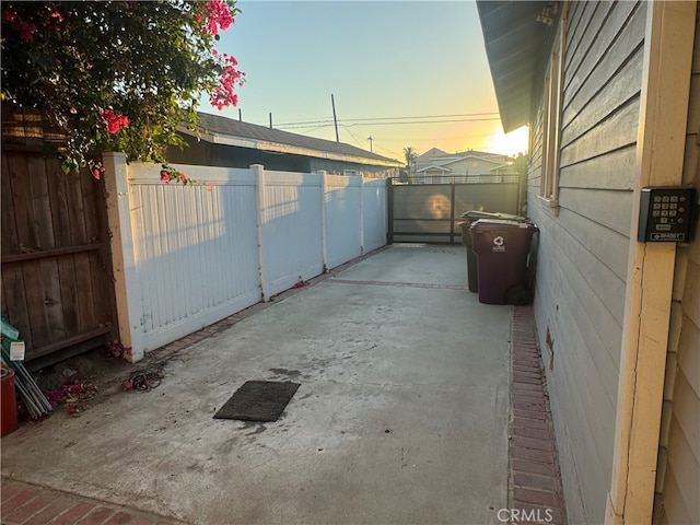 view of patio terrace at dusk