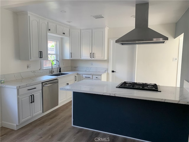 kitchen featuring island range hood, dishwasher, white cabinets, and sink