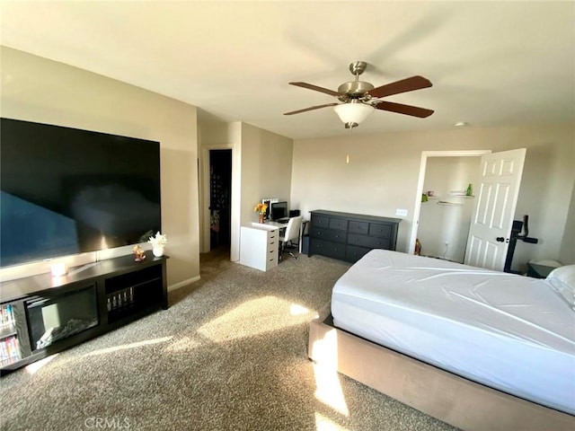 bedroom with carpet floors, a closet, and ceiling fan