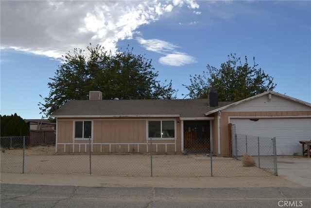 single story home with a garage