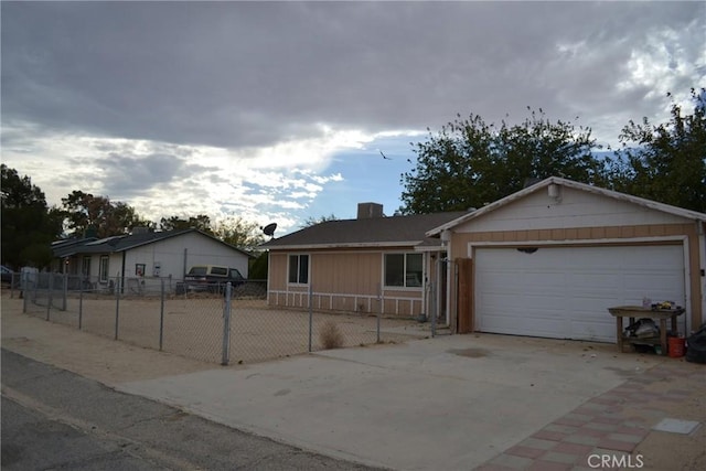 ranch-style home with a garage