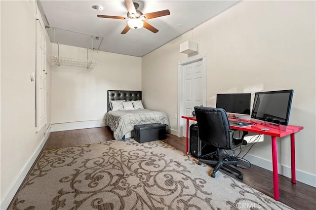 bedroom featuring hardwood / wood-style flooring and ceiling fan