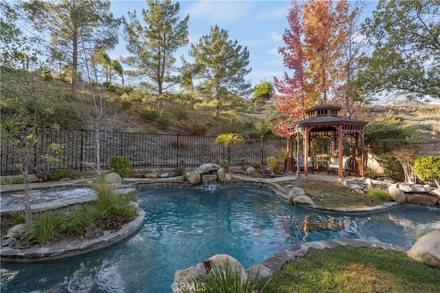 view of swimming pool with a gazebo