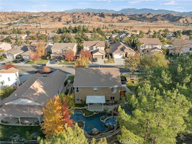 bird's eye view with a mountain view