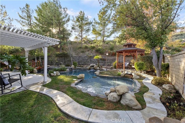 view of yard featuring a gazebo, a pergola, and a fenced in pool