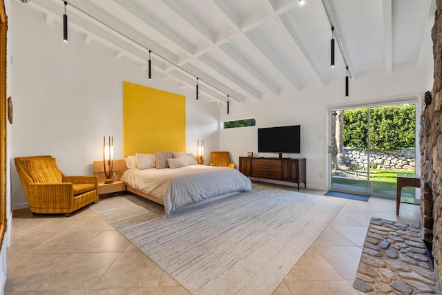 tiled bedroom with high vaulted ceiling, access to exterior, and beam ceiling