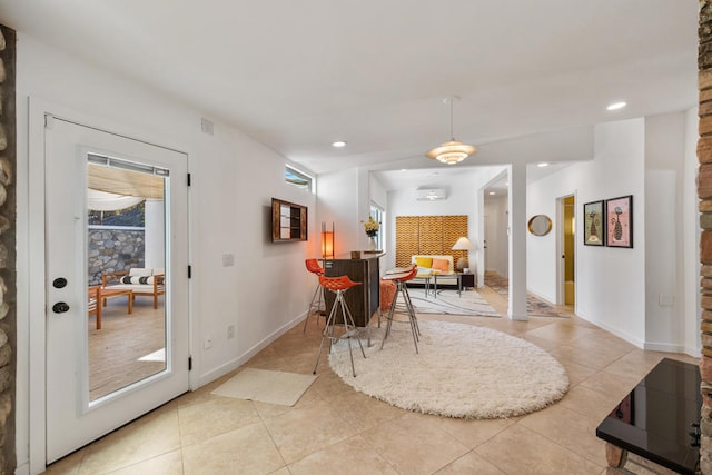 dining space featuring light tile patterned floors