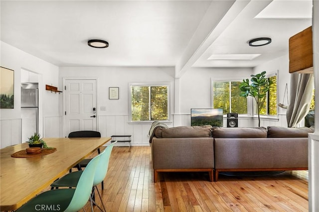 living room featuring light hardwood / wood-style flooring and plenty of natural light