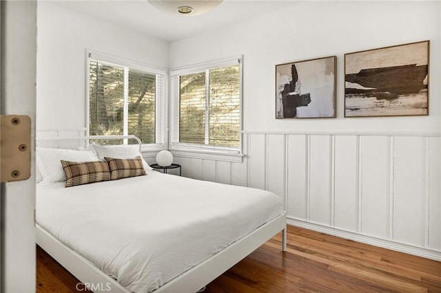 bedroom featuring wood-type flooring