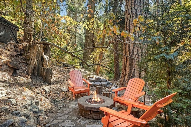 view of patio featuring a fire pit