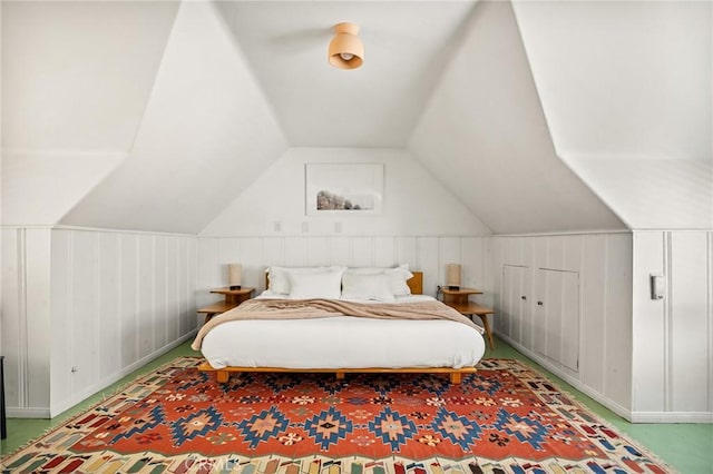 bedroom with lofted ceiling