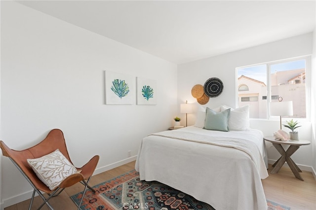 bedroom featuring hardwood / wood-style floors