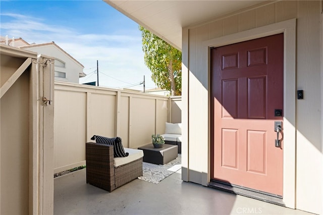 entrance to property with a patio area