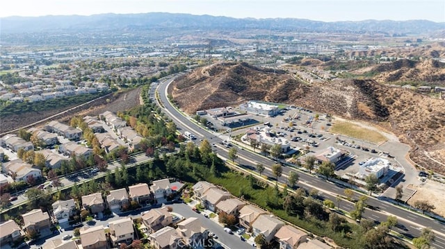 aerial view featuring a mountain view and a residential view