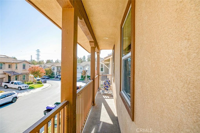 balcony featuring a residential view