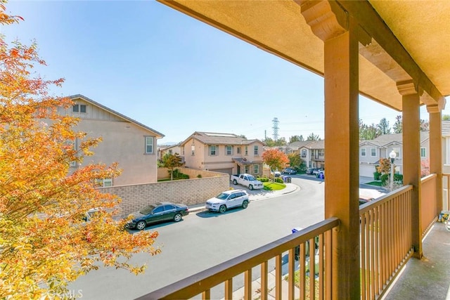 balcony featuring a residential view