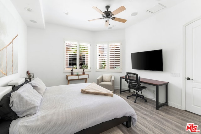 bedroom featuring ceiling fan and light wood-type flooring