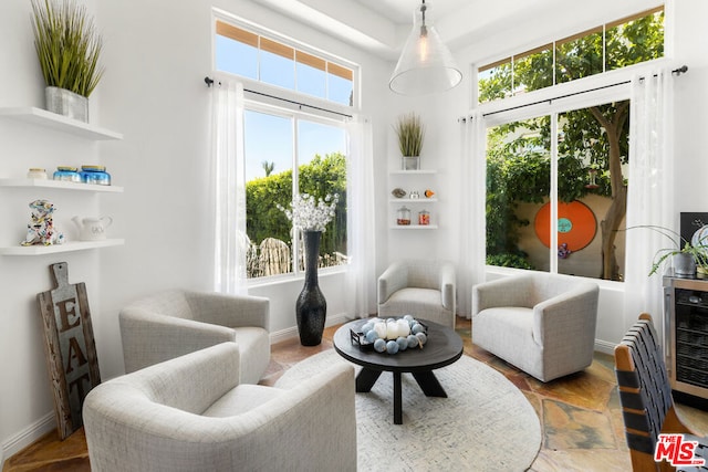 sitting room with hardwood / wood-style floors