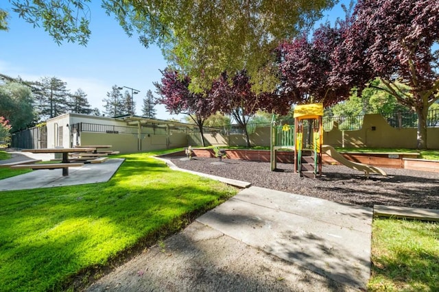 view of jungle gym with a yard