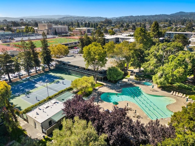 birds eye view of property featuring a mountain view