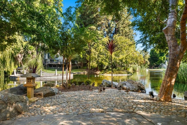 view of patio featuring a water view