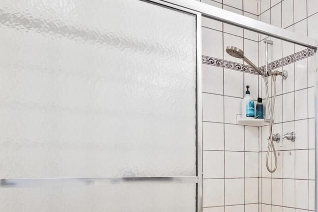 bathroom with an enclosed shower