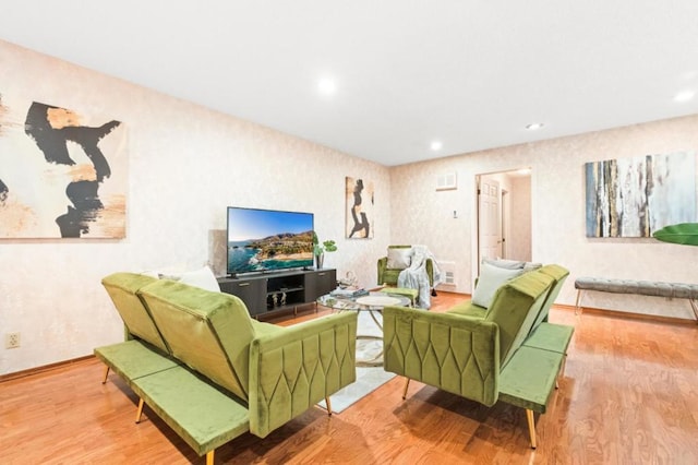 living room with light hardwood / wood-style floors