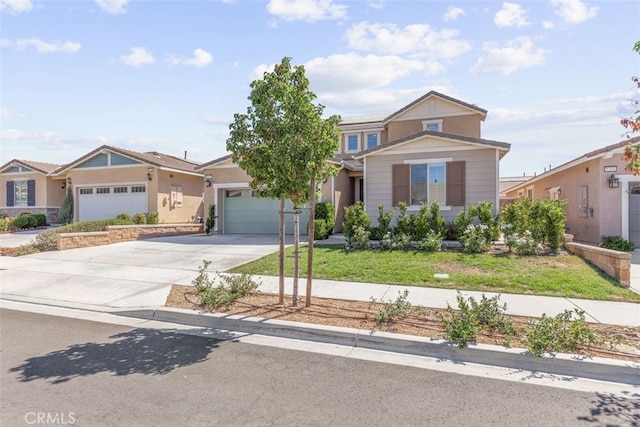 view of front of house with a front lawn and a garage