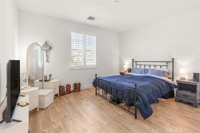 bedroom featuring light hardwood / wood-style flooring