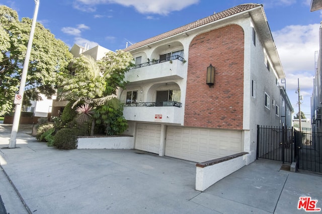 view of building exterior featuring a garage