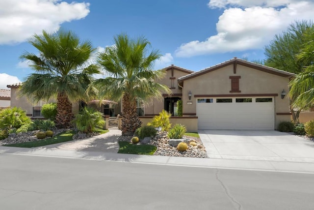 mediterranean / spanish-style home featuring a garage