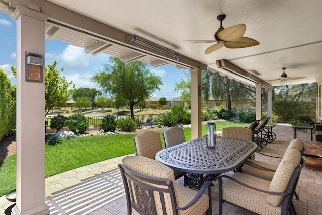 view of patio / terrace featuring ceiling fan