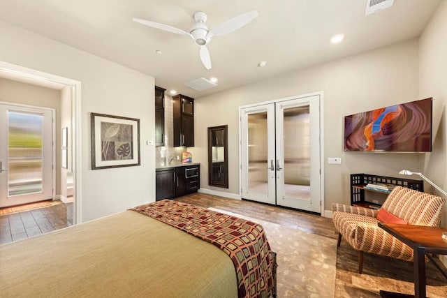 bedroom with access to exterior, ceiling fan, french doors, and hardwood / wood-style flooring